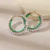 Venta al por mayor de pendientes grandes de aro estilo coreano con perlas y cristales, un accesorio moderno y lujoso para mujer, con un diseño único y vintage