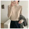Camiseta base de estilo básico con cuello semi-alto y borde enrollado para mujer Primavera 2026 Otoño/Invierno nuevo estilo suéter temperamento tejido suave y liso