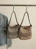 Bolsa de Palha Tecida de Verão Transfronteiriça para Mulheres 2026 Novo Estilo Vazada de Ombro Único Estilo Pastoral Estilo Preguiçoso Bolsa de Palha Estilo Balde Transversal