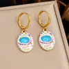 Brincos em formato de flor, design oval, com efeito de óleo escorrendo, aço inoxidável banhado a ouro, doces e versáteis, brincos femininos fashion e modernos, disponíveis na Amazon