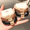 Corea del Sur Dongdaemun otoño e invierno nuevo básico para llevar debajo oso de peluche cara sonriente etiquetado anillo para el cabello lindo niña goma elástica