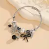 Pulseira de Miçangas DIY Estilo Luxo Leve Preto e Branco Múltiplos Pingentes Corrente Osso de Cobra Moda Transfronteiriça Europeia e Americana Pulseira Acessórios Femininos Atacado