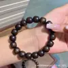 Pulsera de un solo círculo de cuentas de barril de madera de agarwood Qinan verde de seda dorada Pulsera de cuentas de Buda de joyería de moda DIY