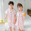 Comércio Exterior Pijama Infantil Imitação de Seda de Gelo para Meninos e Meninas Primavera e Outono Calça de Manga Curta Cardigã de Cor Sólida Gola Lapela Cetim Roupas de Casa