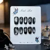 Uñas press-on cortas cuadradas-redondas estilo ojo de gato negras con accesorios florales plateados hechos a mano, geniales y elegantes, piezas de arte de uñas terminadas desmontables