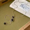 Collar con colgante de madera y cordón de cuero, moderno, a la moda, versátil, elegante, cadena para suéter, lujo ligero, sensación de alta gama, venta al por mayor de joyería