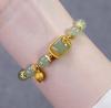 Ailian imitación jade Hetian natural adorno de loto dorado mate pulsera simple de lujo ligero para novias regalo para novia