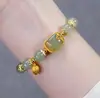 Paso a paso imitación de flor jade Hetian pequeño colgante pulsera de orquídea de lujo ligero diseño de nicho de lujo regalo para novia