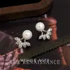 Pendientes de Perla Francesa y Circonita Estilo Vintage Ligero Mediados de Siglo Lujo Accesible Estilo Femenino Dos Formas de Usar Pendientes de Alta Gama