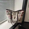 Bolsa Estampada Graffiti da Moda para Mulheres, Nova Bolsa Transversal, Bolsa de Ombro Versátil de Nicho, Bolsa Saco Portátil para Ir ao Trabalho e Sair