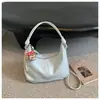 Bolsa de Ombro para Uso Diário de Luxo Feminina 2026 Novo Estilo Verão Popular Bolsa de Ombro Único Bolsa Tote Transversal de Grande Capacidade