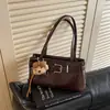 Bolso de hombro de moda nicho vintage transfronterizo para mujer 2026 nuevo modelo fresco y simple bolso de hombro para el día a día bolso de axila