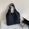 Bolso de lona versátil transfronterizo para mujer modelo nuevo 2025 bolso de mano de gran capacidad bolso de hombro único bolso de axila bolso tote para el trabajo