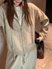 Nueva chaqueta suéter de punto con capucha para mujer, otoño e invierno, con diseño de cremallera, corte holgado, casual y versátil, top casual y relajado