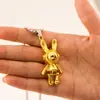 Collar de conejo mecánico móvil, accesorio de moda de hip-hop para hombre y mujer, diseño de nicho, estilo suéter para pareja, cadena de suéter.