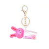 Chaveiro Criativo de Coelho Brilhante com Areia Líquida Pingente de Desenho Animado em Acrílico Acessório para Carro Mochila Presente Fofo para Meninas