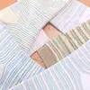 Meias Peijo listradas color block retrô, macias e respiráveis, atacado de Zhuji, versáteis para outono e inverno, meias femininas de cano médio