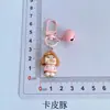 Llavero de muñeca llorona transfronteriza, colgante de campanita de cuentas, accesorio de resina de dibujos animados moderno y lindo para bolso, pequeño regalo para niñas