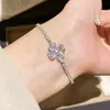 Pulsera de flor de circonita y nácar chapada en oro real de 18k, pulsera de estilo coreano ins de alta gama, joyería versátil de lujo ligero para mujer