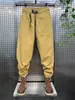 Macacão Masculino Moda Marca 2024 Verão Nova Chegada Calça Casual de Pernas Soltas Versátil Verde Militar Moda Nacional Bonito Calça Harem