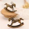 Fábrica de joyería Yiwu, venta al por mayor, antiguo colgante de caballo mecedor DIY, bonitos pendientes colgantes, material DIY