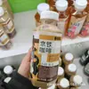 Café con Leche Xiaoyejiuli Americano de Toronja Gota de Hielo Latte 380ml*15 Botellas