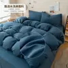 Exportación transfronteriza, juego de ropa de cama de cuatro piezas de algodón lavado, color sólido de doble cara, alto GSM, adecuado para dormitorios de estudiantes, camas individuales y dobles, venta al por mayor