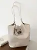 Bolso de hombro grande de verano 2026 para mujer, patrón tejido de nicho estilo coreano transfronterizo, elegante bolsa tote para ir al trabajo