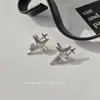 Pendientes de botón de estrella Awn de cuatro piezas diseño de nicho femenino pendientes de alto sentido pendientes de estilo frío de celebridad de Internet moda