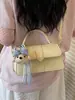 Bolsa de Mão da Moda Versátil com Textura de Alta Qualidade Estilo Coreano para Mulheres Novo Modelo Verão 2026 Bolsa Quadrada Pequena de Ombro Cruzado