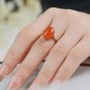 Anillo de Plata de Ley S925 Chapado en Oro con Cara de Huevo Rojo del Sur de Cuatro Garras Simple Moderno Exquisito Personalidad Moderna Mujeres