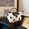 Bolso de mano con solapa de cuero y correa de hombro intercambiable, bolso cruzado de un solo hombro para mujer, bolso tipo dumpling clásico de tela de lunares grandes 2026