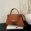 Bolsos de moda tendencia 2026 nuevo modelo patrón de cocodrilo elegante simple para el día a día hombro bandolera venta al por mayor