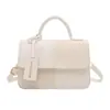Bolso de Mano Pequeño de Color Contrastante Moda Retro al por Mayor 2025 Nuevo Bolso Cuadrado Pequeño Simple Versátil Bolso Cruzado con Textura