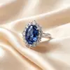 Anel de Safira Sintética Oval S925 Prata Europeu e Americano Transfronteiriço, Estilo Princesa Diana, Rodeado por Diamantes, Noivado Aniversário, Luxo Leve, Versátil