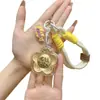 Versión Dorada del Bolso Colgante para Teléfono Móvil Flor Rica Llavero de Oro Puro Llave Colgante de Oro Transmisión en Vivo