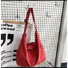 2026 Nueva Bolsa Cruzada de Moda Callejera Japonesa para Hombres y Mujeres Ins Harajuku Marca de Tendencia Bolsa de Hombro Retro de Lona para Estudiantes