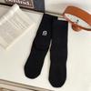 Calcetines para hombre otoño e invierno marca de moda bordado de letras calcetines deportivos tubo medio calcetines para hombre primavera y otoño calcetines para hombre venta al por mayor