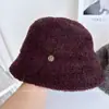 Sombrero de pescador de rizo simple elegante japonés para mujer otoño invierno elegante pequeño logo moderno sombrero de cubo versátil hace que la cara se vea más pequeña sombrero de cubo