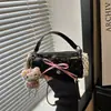 Bolsa de mão fashion e doce estilo coreano com laço e poá, compacta e estilosa, elegante bolsa transversal cilíndrica