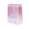 Bolso transparente bolsa de regalo PP esmerilado bolsa de tienda de ropa bolsa para lavar y proteger maquillaje bolsa de embalaje de regalo para manos logotipo personalizado