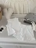 87018 Conjunto de Ropa de Casa para Niñas 2026 Nuevo Estilo Principios de Primavera Conjunto de Dos Piezas de Chaleco y Shorts para Bebé Tejido Transpirable y Absorbente