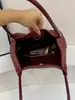 Bolso de mano retro muy elegante con patrón tejido, nuevo modelo de verano 2026, bolso de hombro de color liso a la moda, bolso tipo cubo de mano, moderno
