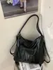 Nueva bolsa de estudiante de gran capacidad para mujer, versátil y texturizada, bolso de un solo hombro bajo el brazo, bolso de mano de cuero suave de moda