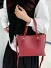 2025 Bolso Nuevo Transfronterizo Bolso de Hombro de Nicho para Mujer Simple Portátil Tejido Cruzado Bolso de Mujer Moderno y Versátil