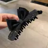 Nuevo estilo pinza de plátano vertical con lazo de pedrería para mujer, pinza para el pelo fácil de usar con un toque de alta gama, accesorio para el pelo de pinza de garra para recogido de coleta negra
