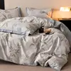Nuevo juego de cuatro piezas de algodón puro estampado engrosado cepillado para otoño e invierno, sábana de algodón puro y funda de edredón, juego de cuatro piezas de ropa de cama de alta gama