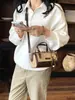 Bolso Boston Vintage con Estampado de Leopardo para Mujer, Bolso Cruzado de Hombro Patchwork Marrón Oscuro, Nuevo Modelo 2026 con Colgante de Flor 3D de Moda