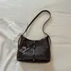 Bolso de axila para ir al trabajo para mujer 2026 Nuevo Bolso tote de verano de alta gama de gran capacidad de un solo hombro cruzado tipo cubo