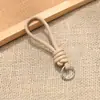 Bolsa de Corda de Couro PU Colorida Pingente Estilo Miu Simples Versátil Charme de Bolsa Chaveiro Acessório Lanyard de Celular Estilo Curto Novo
